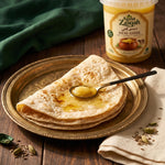 Paratha with Apna Zaiqah desi ghee poured on top
